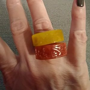 Pair of carved stone rings